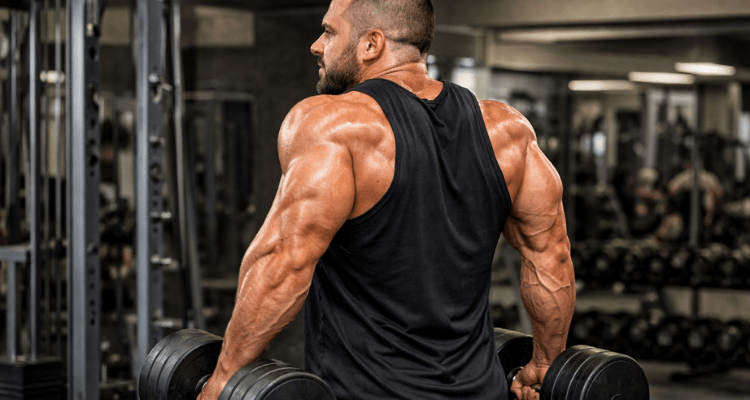 Encolhimento com halteres para trapézio superior